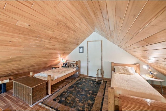 62405 Delta Lake Rd, Iron River, WI 54847 - bedroom featuring wood ceiling, vaulted ceiling, and wood finished floors