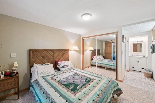 62405 Delta Lake Rd, Iron River, WI 54847 - carpeted bedroom featuring a closet and ensuite bathroom