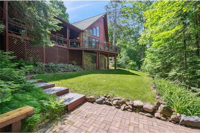 62405 Delta Lake Rd, Iron River, WI 54847 - view of green lawn featuring a deck