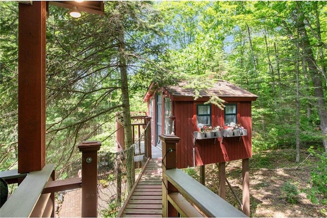 62405 Delta Lake Rd, Iron River, WI 54847 - view of outbuilding featuring a view of trees