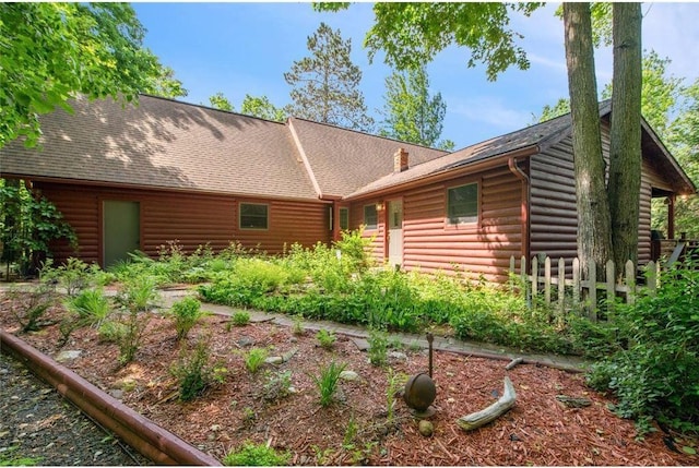 62405 Delta Lake Rd, Iron River, WI 54847 - back of house with faux log siding