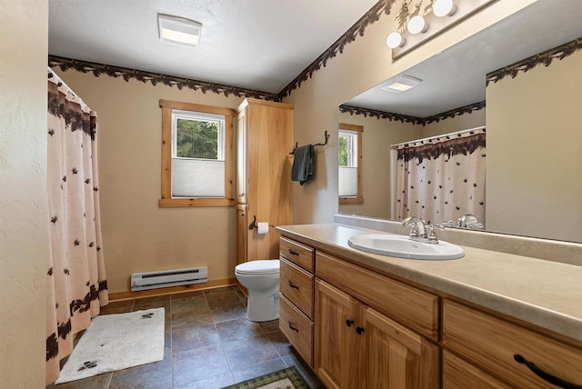 4721 Lake Of The Woods Rd, Sturgeon Bay, WI 54235 - bathroom with baseboard heating, vanity, and a shower with curtain