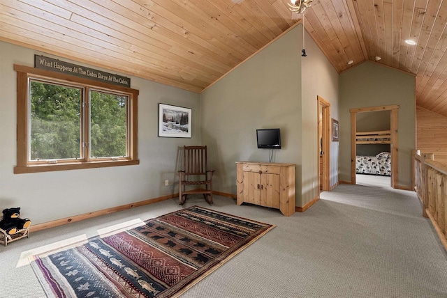 4721 Lake Of The Woods Rd, Sturgeon Bay, WI 54235 - living area featuring carpet floors, vaulted ceiling, and wood ceiling