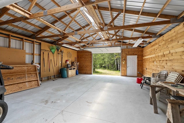 4721 Lake Of The Woods Rd, Sturgeon Bay, WI 54235 - garage featuring wood walls