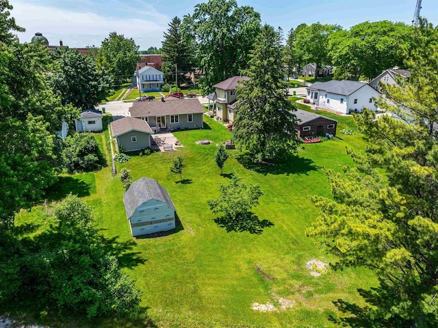 238 N State St, Chilton, WI 53014 - aerial view of residential area with a tree filled landscape