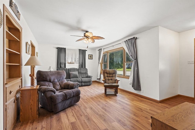 238 N State St, Chilton, WI 53014 - living area featuring ceiling fan and wood finished floors