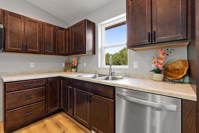997 E Sunnyview Rd, Oshkosh, WI 54901 - kitchen with dishwasher, light wood finished floors, light countertops, and vaulted ceiling