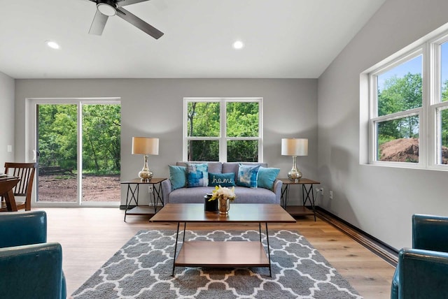 997 E Sunnyview Rd, Oshkosh, WI 54901 - living area featuring healthy amount of natural light, wood finished floors, ceiling fan, and recessed lighting