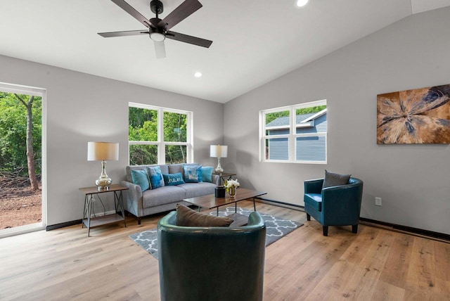 997 E Sunnyview Rd, Oshkosh, WI 54901 - living room with vaulted ceiling, healthy amount of natural light, light wood-type flooring, recessed lighting, and a ceiling fan