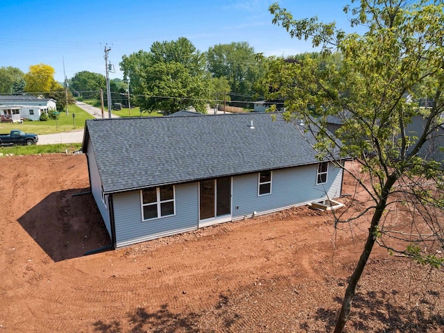 997 E Sunnyview Rd, Oshkosh, WI 54901 - rear view of house with roof with shingles