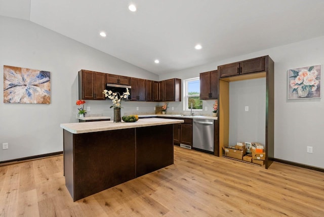 997 E Sunnyview Rd, Oshkosh, WI 54901 - kitchen with stainless steel appliances, dark brown cabinetry, light countertops, light wood finished floors, and lofted ceiling