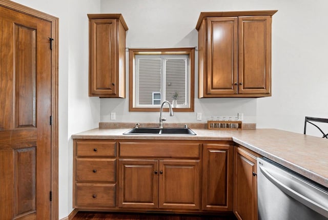 4835 Isabella Cir, Hobart, WI 54155 - kitchen with dishwasher, brown cabinetry, and light countertops