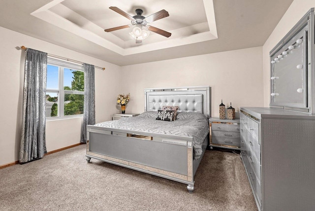 4835 Isabella Cir, Hobart, WI 54155 - bedroom with carpet floors, a tray ceiling, and a ceiling fan