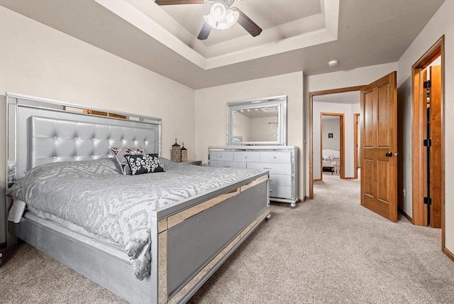 4835 Isabella Cir, Hobart, WI 54155 - bedroom with light colored carpet, a tray ceiling, and a ceiling fan