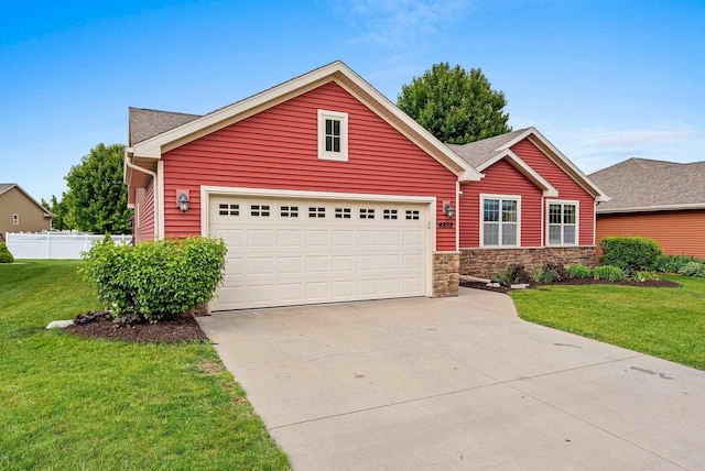 4835 Isabella Cir, Hobart, WI 54155 - view of front of house with concrete driveway and stone siding