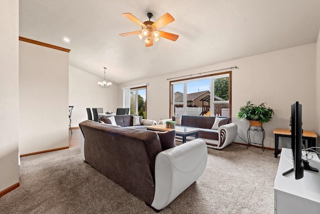 4835 Isabella Cir, Hobart, WI 54155 - carpeted living room with healthy amount of natural light, vaulted ceiling, ceiling fan, and a chandelier