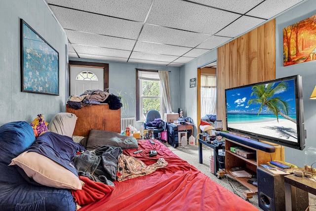 628 End Ct Unit 628A, Sheboygan, WI 53081 - bedroom featuring radiator heating unit, a paneled ceiling, and carpet floors