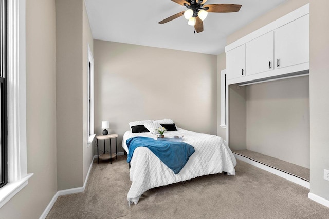 907 Lawe St, Kaukauna, WI 54130 - bedroom with light colored carpet and ceiling fan