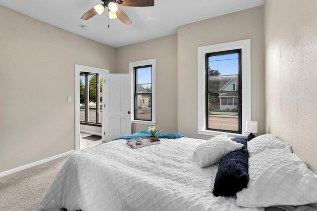 907 Lawe St, Kaukauna, WI 54130 - bedroom with carpet flooring, multiple windows, and ceiling fan