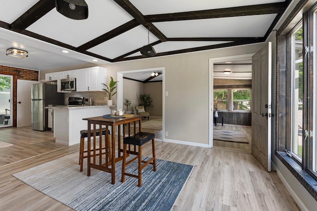 907 Lawe St, Kaukauna, WI 54130 - dining space with light wood finished floors and recessed lighting