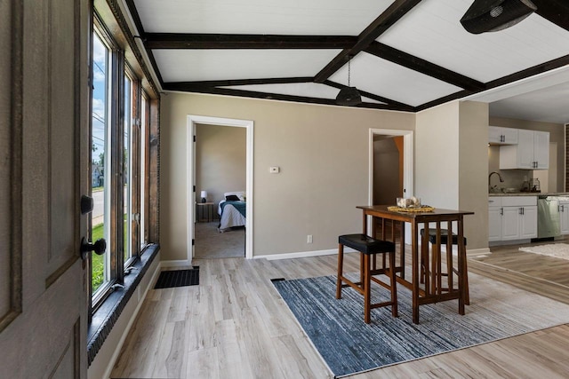 907 Lawe St, Kaukauna, WI 54130 - dining area with light wood-type flooring and baseboards