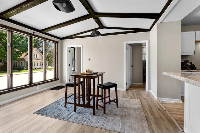907 Lawe St, Kaukauna, WI 54130 - dining area with light wood-style floors and baseboards