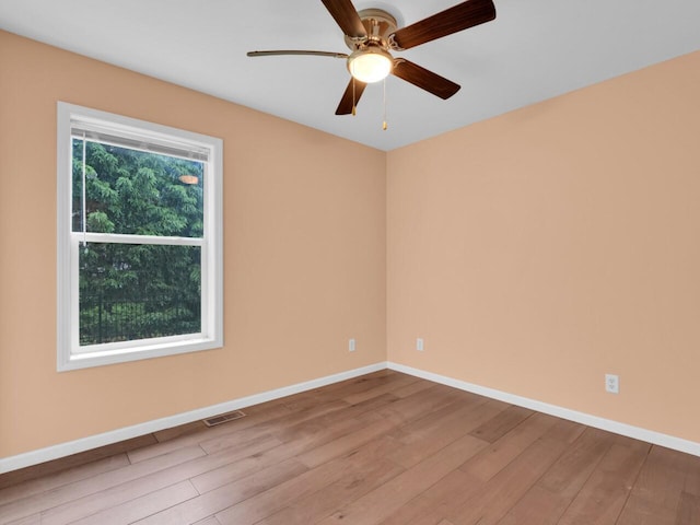 8300 Fishman Rd, Burlington, WI 53105 - unfurnished room with wood finished floors and a ceiling fan