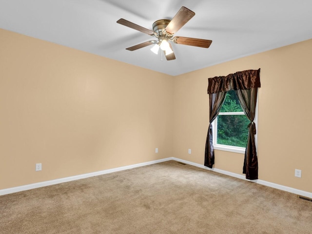 8300 Fishman Rd, Burlington, WI 53105 - carpeted spare room with ceiling fan and baseboards