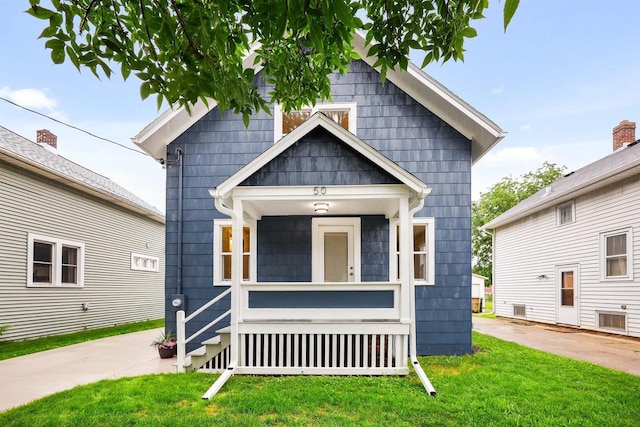 50 S Marquette St, Madison, WI 53704 - shotgun-style home with a front lawn