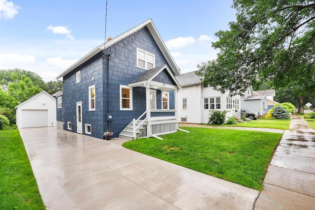 50 S Marquette St, Madison, WI 53704 - view of front facade featuring an outbuilding, a garage, and a front yard
