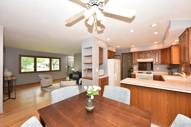 8535 N 59th St, Brown Deer, WI 53223 - dining area featuring light wood-style flooring, a ceiling fan, and recessed lighting