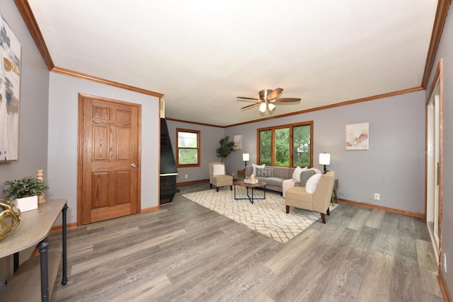 8535 N 59th St, Brown Deer, WI 53223 - living room with light wood finished floors, crown molding, and a ceiling fan