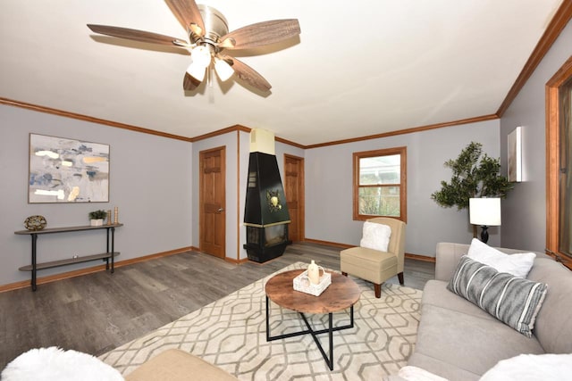8535 N 59th St, Brown Deer, WI 53223 - living area with wood finished floors, a ceiling fan, and ornamental molding