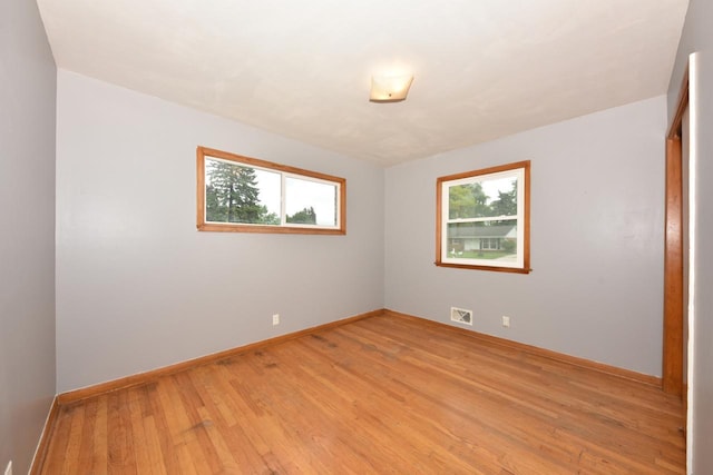 8535 N 59th St, Brown Deer, WI 53223 - empty room with light wood finished floors and baseboards