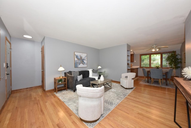 8535 N 59th St, Brown Deer, WI 53223 - living area featuring light wood finished floors and a ceiling fan