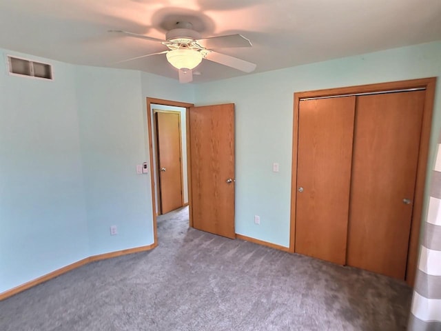 3201 Mockingbird Way, Oshkosh, WI 54904 - unfurnished bedroom with carpet flooring, a closet, and a ceiling fan