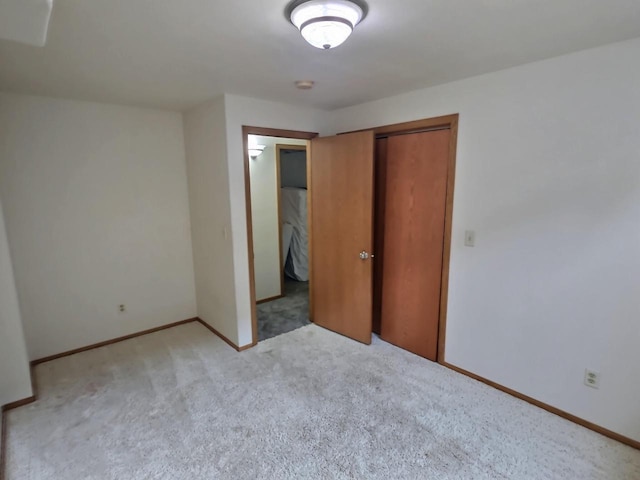 3201 Mockingbird Way, Oshkosh, WI 54904 - unfurnished bedroom with carpet floors and a closet