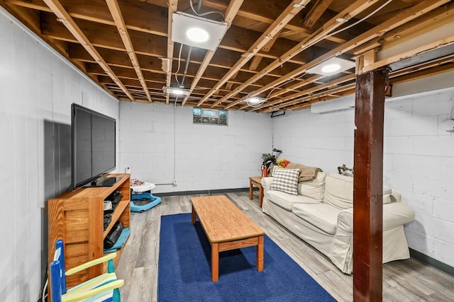 2750 N 86th St, Milwaukee, WI 53222 - living room featuring wood finished floors and concrete block wall