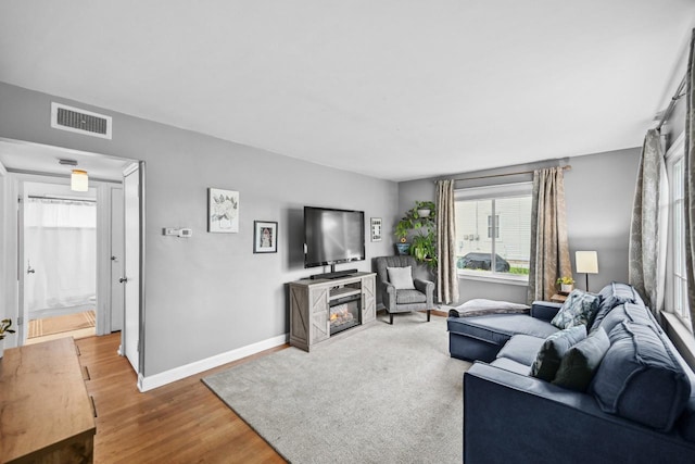 2750 N 86th St, Milwaukee, WI 53222 - living room featuring wood finished floors and baseboards