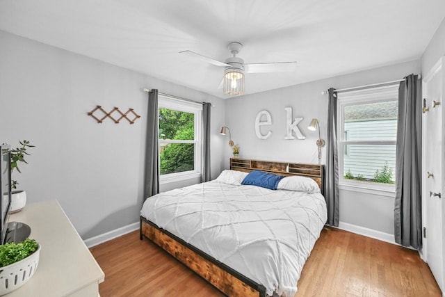 2750 N 86th St, Milwaukee, WI 53222 - bedroom with wood finished floors and ceiling fan