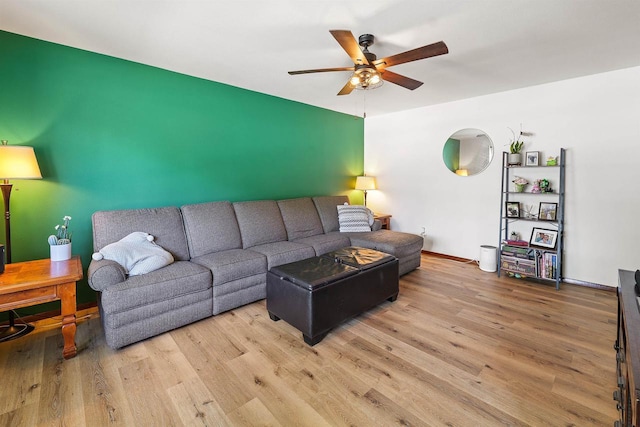 605 E 10th St, Fond Du Lac, WI 54935 - living room featuring a ceiling fan and wood finished floors