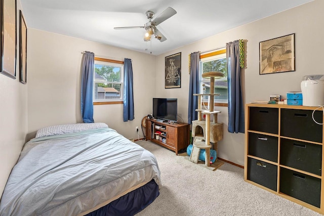 605 E 10th St, Fond Du Lac, WI 54935 - bedroom with carpet floors and ceiling fan