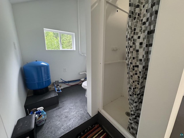 3406 S County Rd E, South Range, WI 54874 - bathroom featuring a shower stall and toilet