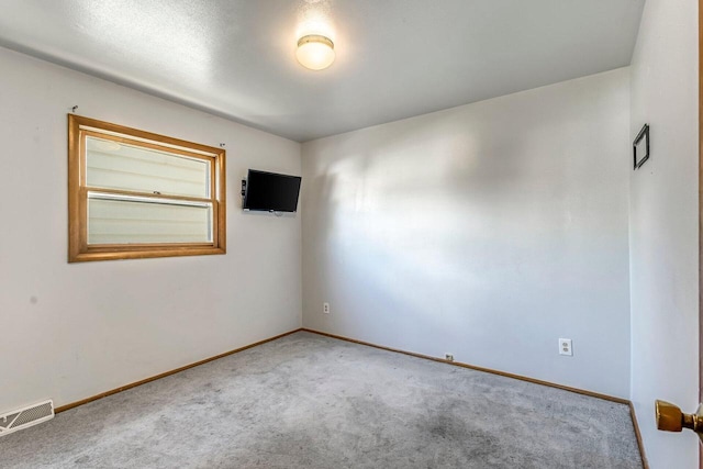 1128 S 62nd St, West Allis, WI 53214 - carpeted spare room featuring baseboards