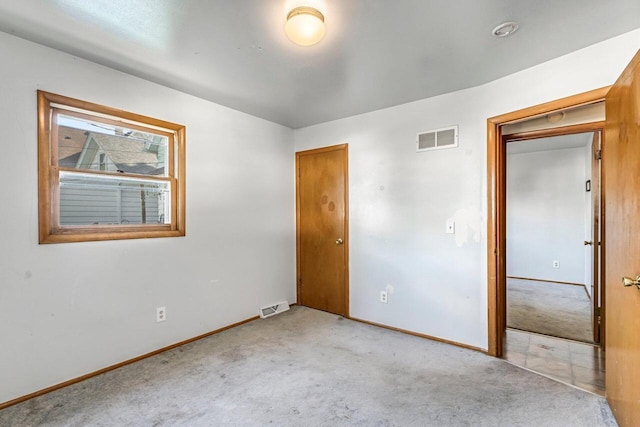 1128 S 62nd St, West Allis, WI 53214 - unfurnished room with light colored carpet and baseboards
