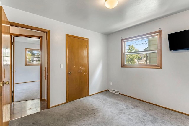1128 S 62nd St, West Allis, WI 53214 - unfurnished bedroom with carpet floors and baseboards
