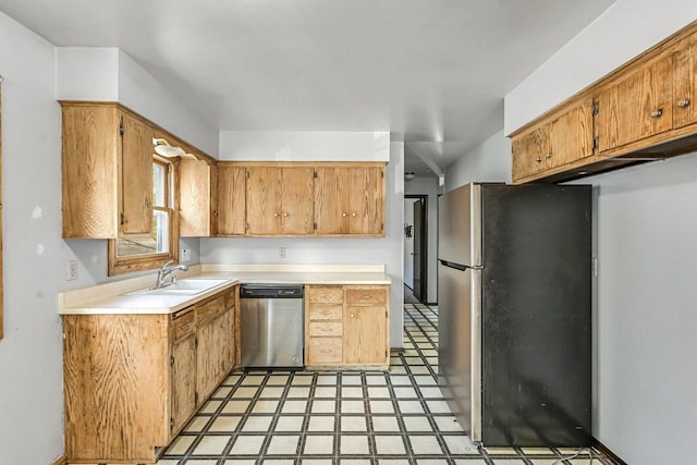 1128 S 62nd St, West Allis, WI 53214 - kitchen featuring stainless steel appliances, light flooring, and light countertops