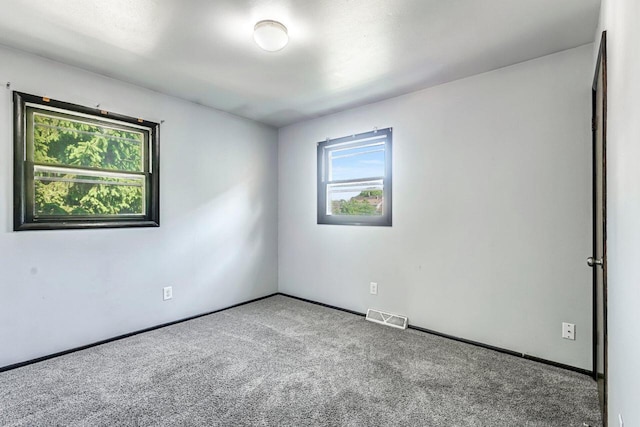 1128 S 62nd St, West Allis, WI 53214 - empty room with carpet flooring and baseboards