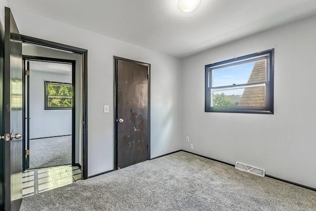 1128 S 62nd St, West Allis, WI 53214 - unfurnished bedroom with carpet flooring and baseboards