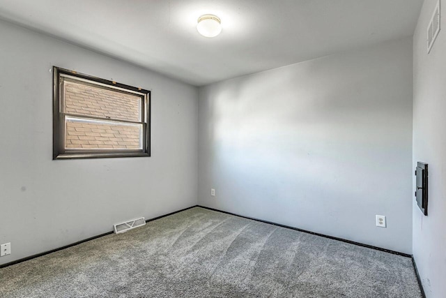 1128 S 62nd St, West Allis, WI 53214 - empty room with carpet flooring and baseboards